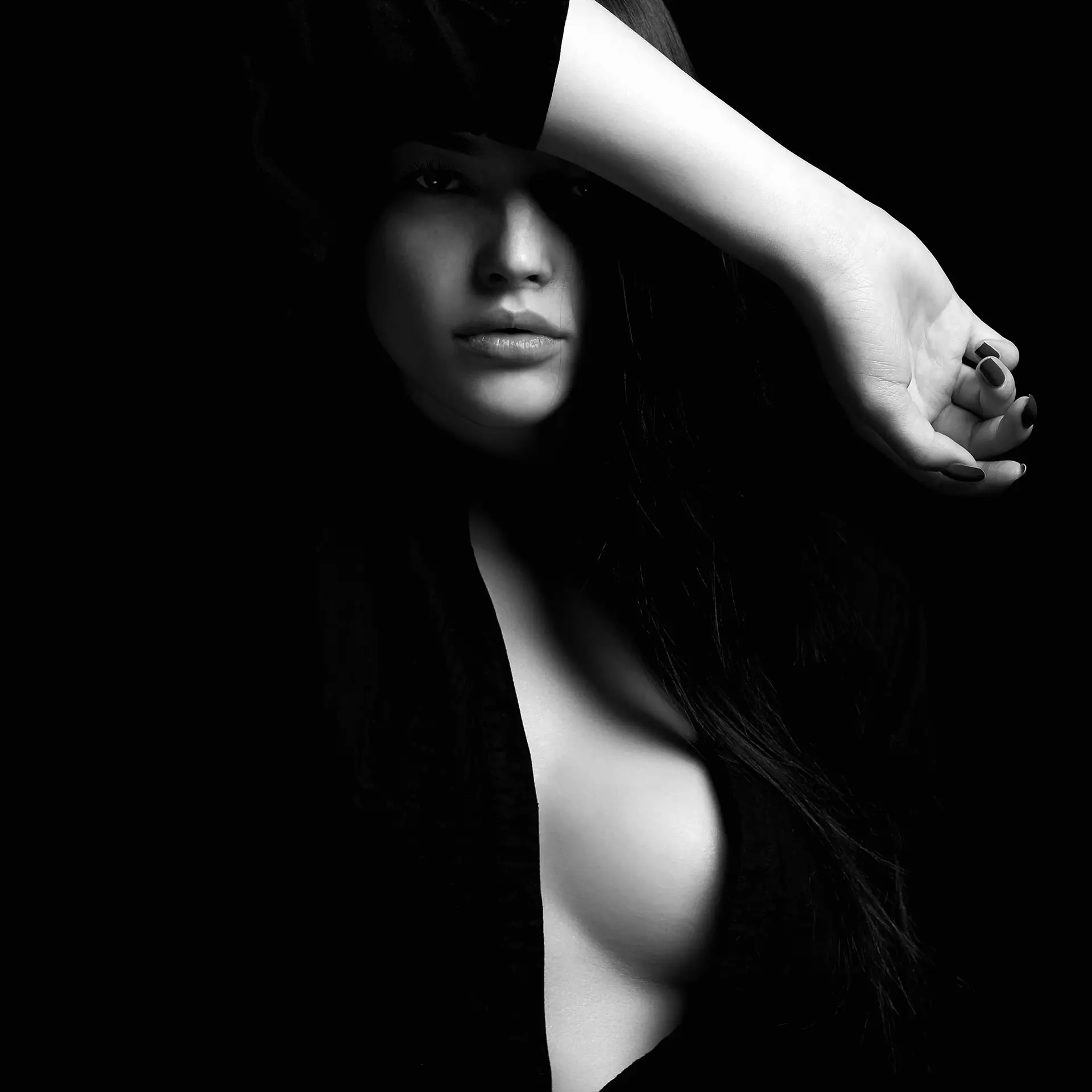 Black-and-white portrait of a confident, healthy individual exuding vitality and strength. The Maxim Clinic Atlanta, GA